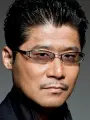 Portrait of person named Tsuyoshi Koyama