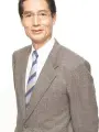 Portrait of person named Yuji Mikimoto