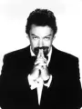 Portrait of person named Tim Curry