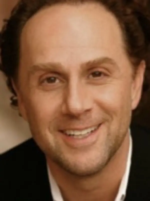 Portrait of person named John Kassir