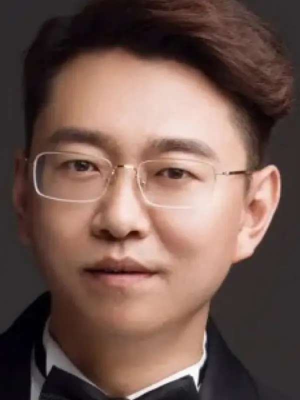 Portrait of person named Mingzhou Zhao